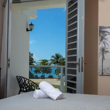 Beachfront in gated community with patio,  balcony, pool, close to all in Rincón