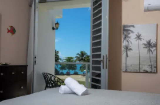 Beachfront in gated community with patio,  balcony, pool, close to all in Rincón