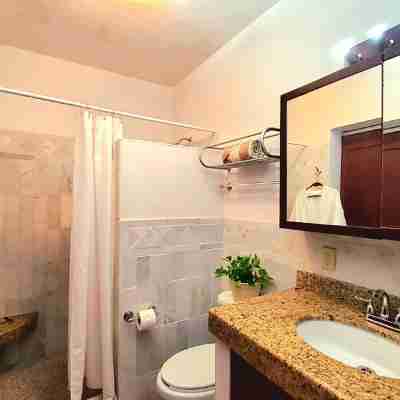 Sunsets + Ocean View Condo with WiFi, A/C, RoofTop, steps to Malecon and Beach Rooms