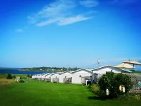 Blue Crest Cottages Hotels in Queens County