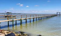 2-bedroom 2 bath..4 beds total Amazing Waterfront condo w/310 ft lit pier