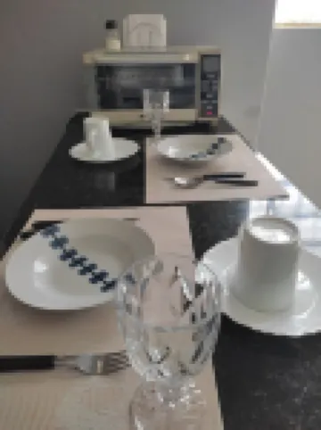 Gray house in the city center, close to hospitals