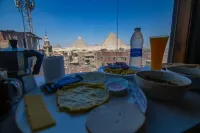 Cozy and clean apartment with epic pyramids view and safe neighborhood