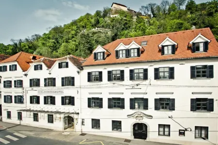 Schlossberghotel Отели в г. Грац
