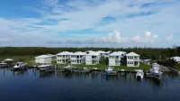 Treasure Cay Getaway with BOAT DOCK!  4 bedroom, pool, & bbq Cabana! Hotel a 