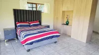 Serene 1-Bedroom Apartment with Garden & Shared Pool