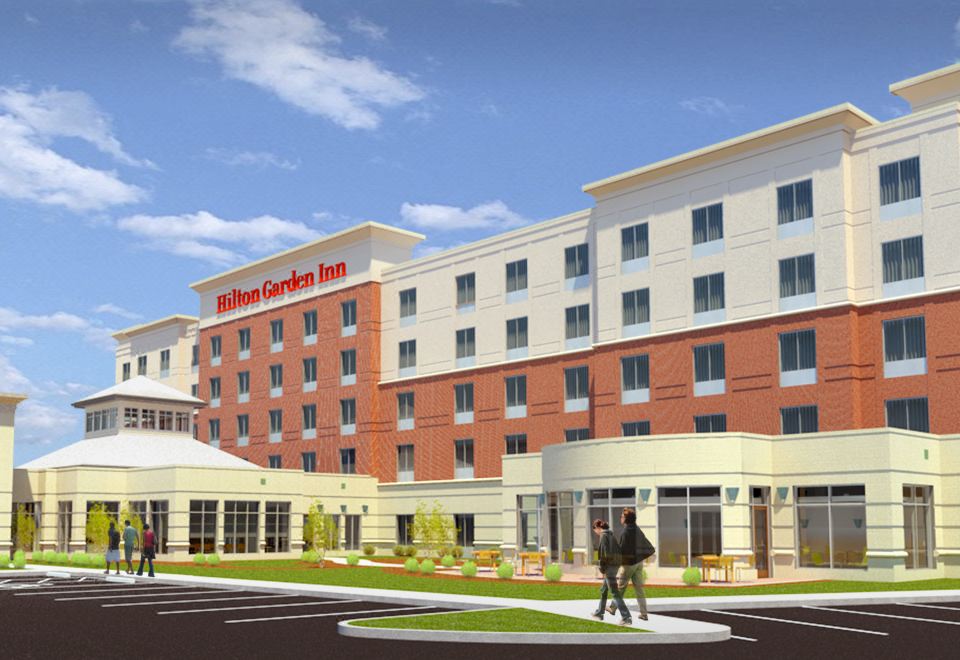a rendering of a large hotel with the hilton garden inn logo on top of the building at Hilton Garden Inn Akron