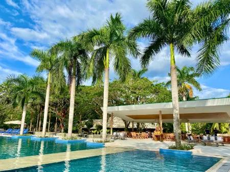 Magnaga Waters Beach Resort Отели в г. Мабини