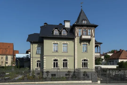 Exklusives Urlaubs-appartement "pfauenauge" Отели в г. Траунштайн