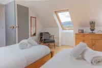 Cuillrigh - Luxury house with Loch Portree & Cuillin Mountain views