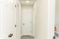 Newly Renovated, 4Bd 2 BA, 1 Full Acre, Sleeps 8, and is Pet Friendly.