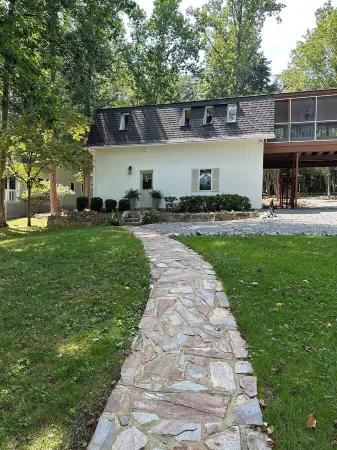 PERFECT LOCATION! Sloping lot, mountain view,  and great cove!