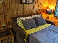 Cozy cabin with backyard stream close to Au Sable River and the best ATV trails Hotels in Oscoda County