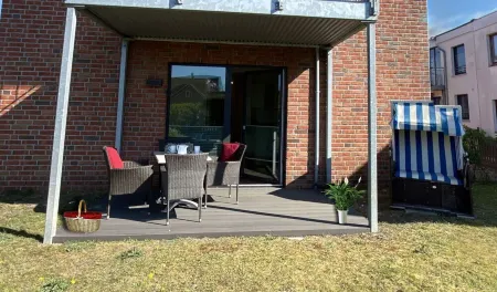 First floor apartment with terrace and garden Отели в г. Боркум