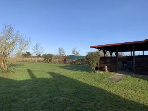 NEW renovated vacation apartment in a quiet location (large fenced property)