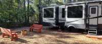 Cozy RV in Enchanting Silver Springs with WiFi, AC, TV, fire pit & horse stable Hotels near Silver Springs State Park Campground