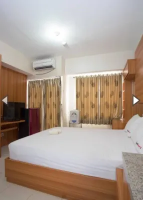 Apartemen Taman Melati Margonda by Winroom Hôtels à : Mekarsari