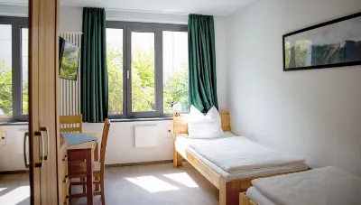 Hotel Garni Fischerfleck فنادق في Ismaning