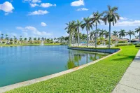 Pool View Balcony and Tropical Landscaping - Beautiful Coastal Escape