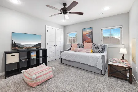 Outdoor Patio with TV and Fire Pit for Relaxation - Charming Oasis