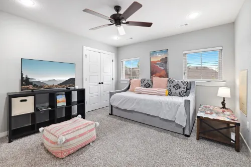 Outdoor Patio with TV and Fire Pit for Relaxation - Charming Oasis