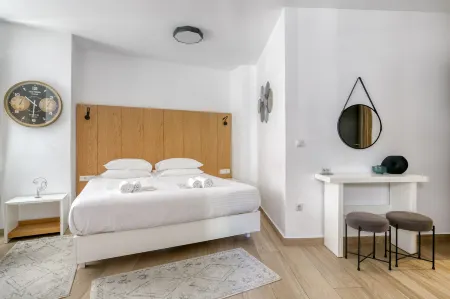 Elia Kolonaki Luxury Apartments Отели рядом с достопримечательностью «Тюрьма Сократа»