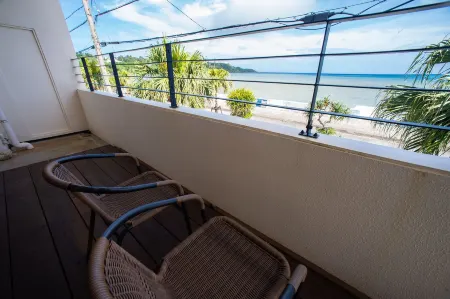 Ocean Front Condo Blue Point Okinawa Отели рядом с достопримечательностью «Senaha Beach»