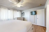 Beachfront townhome w/ on-site beach access, heated pool, patio, grill, AC, W/D