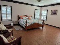 Maxinea's  Hideway is a 6 Bedroom ground level home on 3 Acres in Elberta, AL
