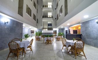 Hotel Axis Inn By GEH Suites