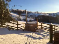 Romantic Stone Cottage with private woodfired hot tub, spa bathroom, yoga deck!