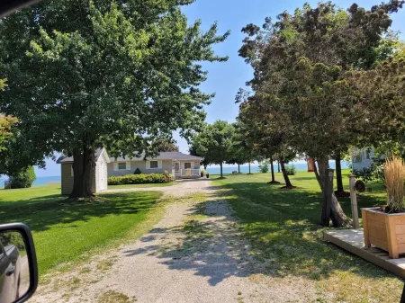 SUNRISE BAY has a panoramic view of Lake Erie with a private beach.