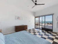 Coastal Casual Bliss: Beach + Pool + Rooftop Deck + Generator + Fast Internet Hotels in Chelem