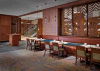 里賈納市中心希爾頓逸林酒店和會議中心 - 早餐