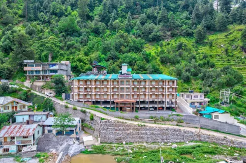 Grand Krisa Resort & Spa, Manali Experience Luxury with All Weather ACs in Every Room Hotels in Shallin