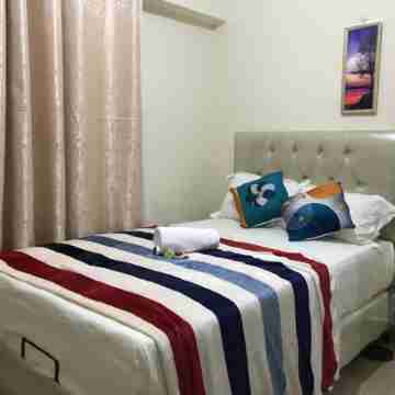 Three-Bedroom Apartment - High Floor Rooms