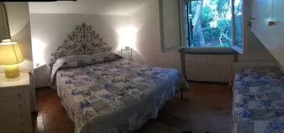 COTTAGE WITH GARDEN AND PRIVATE BEACH Hotels near Minimarket G.F.S