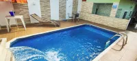 House with swimming pool with LED, waterfall, barbecue, vertical garden