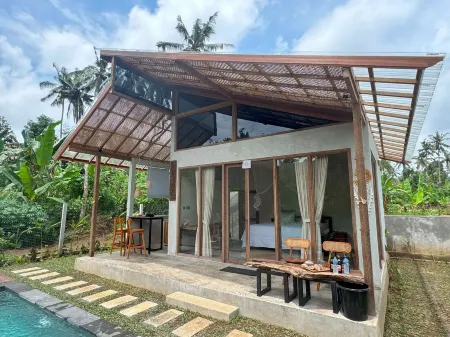 Nestled in the tranquil hills of Kubu Village, Bangli. The private pool villa. Отели рядом с достопримечательностью «Penglipuran Village»