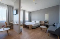 勞加爾壩基飯店 住宿飯店