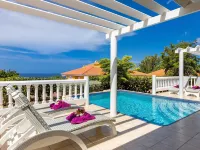 Coral Estate Rentals - Beach