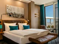 Motel One Munich - Messe Отели рядом с достопримечательностью «Трудеринг-Рим»