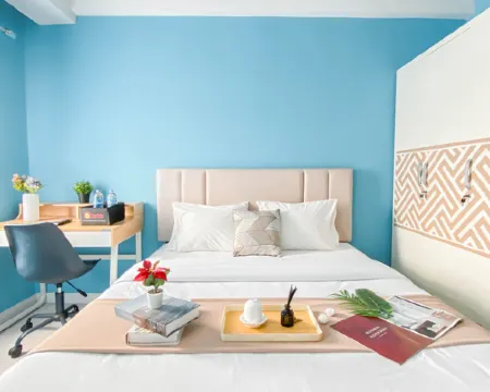 Neat Studio with Blue Toned Wall at Dramaga Tower Apartment By Travelio Hotels in Dramaga