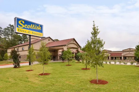 Scottish Inn & Suites - Conroe Отели в г. Конро
