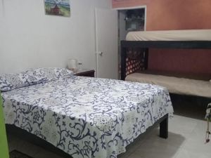 Room in Guest Room - Green Sea Inn in the San Luis Sector