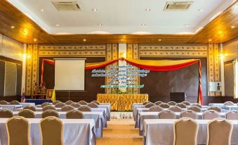 a large conference room with rows of chairs and tables set up for a meeting or event at Nakakiri Resort & Spa