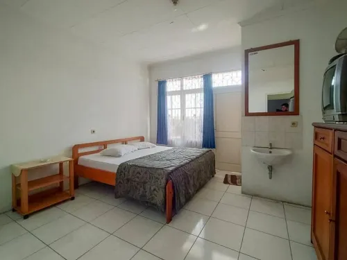 Pall Inn Puncak Mitra RedDoorz
