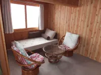 Log House Kurumi Hotels in Higashikagura