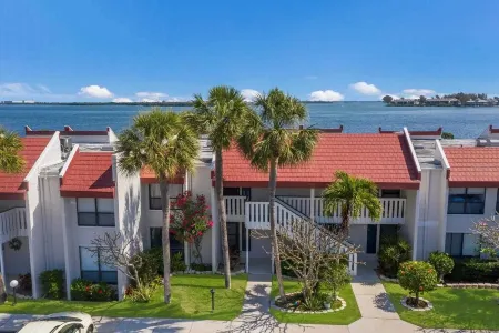 Watch dolphins & pelicans from this 2 bedroom/2 bath waterfront condo.