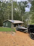 Cozy cabin in the woods.   Close to boat ramp.  Shared 5 bay boat storage